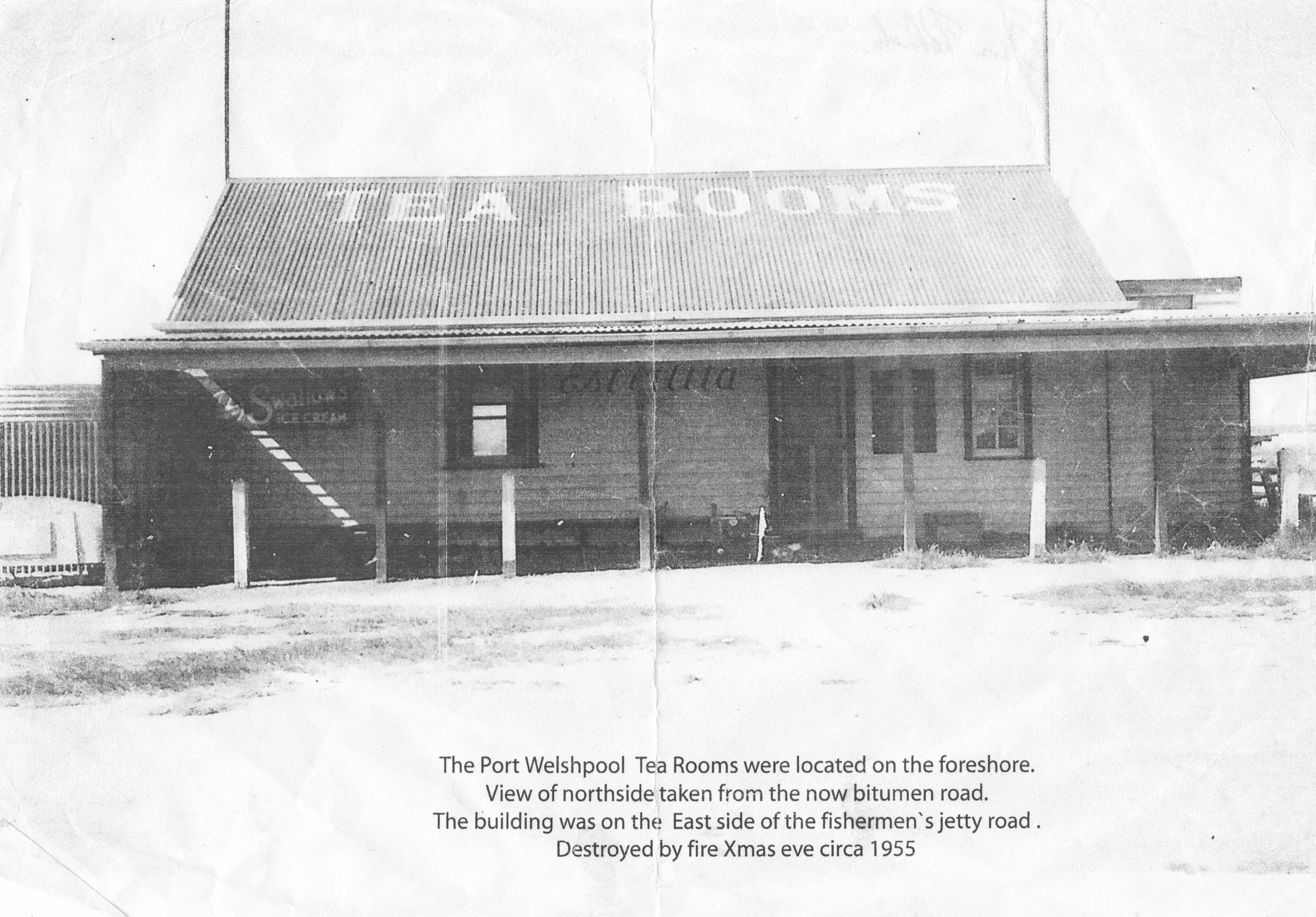 The Port Welshpool Tea Rooms were located on the foreshore.  View of northside taken from the now bitumen road.  The building was on the eastside of the fishermen's jetty road.  Destroyed by fire Xmas eve circa 1955