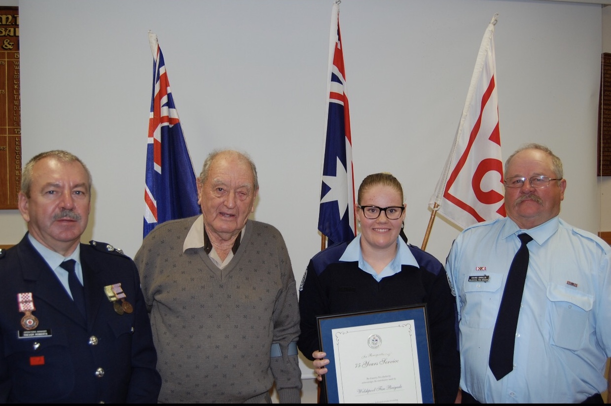 Welshpool CFA members collect their 75 year service award at the District 9 Annual Dinner held in Meeniyan